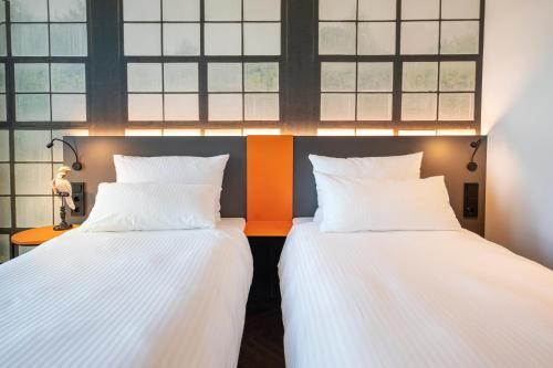 Foto de una habitación de LOGINN Hotel Waiblingen