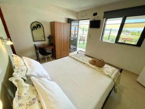Foto de una habitación de Apartamentos Jo Marinis Rooms