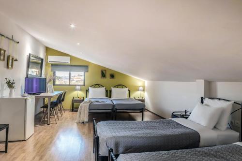 Foto de una habitación de Apartamentos Jo Marinis Rooms