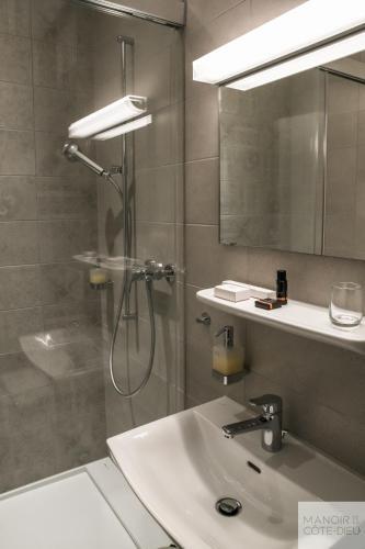 Foto del baño de Hostal Manoir de la Côte-Dieu
