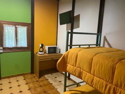 Foto de una habitación de Albergue La HERMIDA