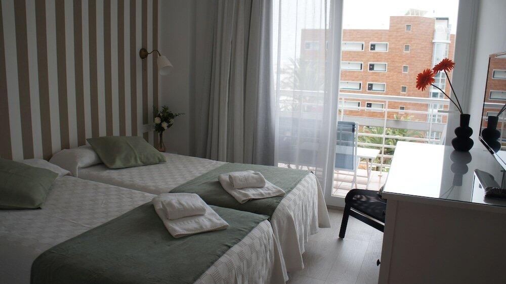 Foto de una habitación de Apartamentos Calma Rentals
