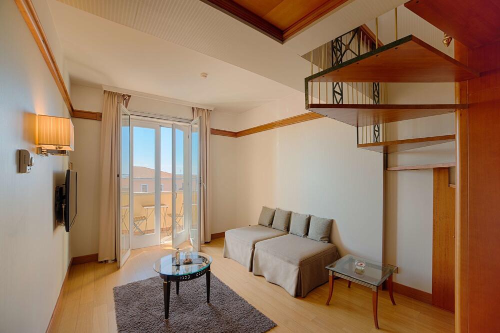 Foto de una habitación de Hotel NH Pisa