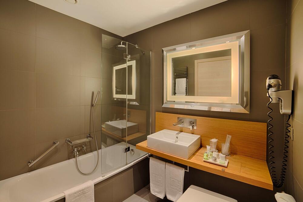 Foto del baño de Hotel NH Pisa
