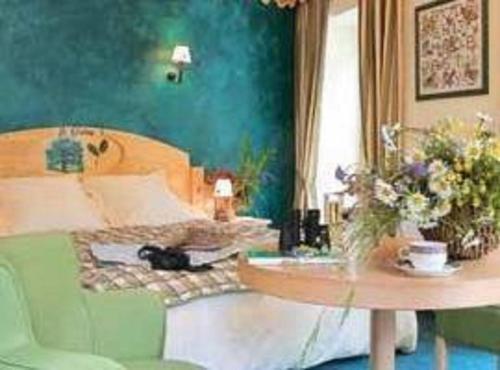 Foto de una habitación de Hôtel Le Bois Joli
