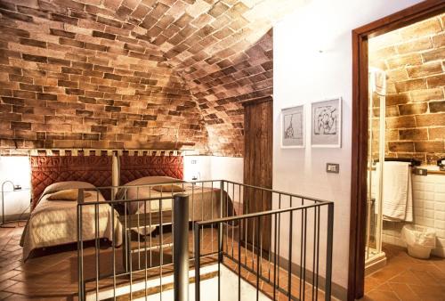 Foto de una habitación de Aparthotel Residenza d&amp;#039;Epoca Palazzo Malfatti