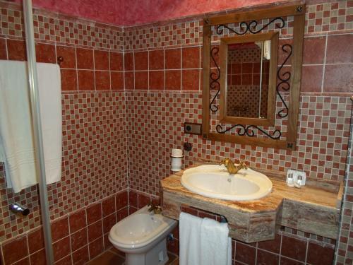 Foto del baño de Hotel El Doncel