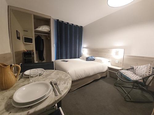 Foto de una habitación de Hôtel-Résidence Le Lys