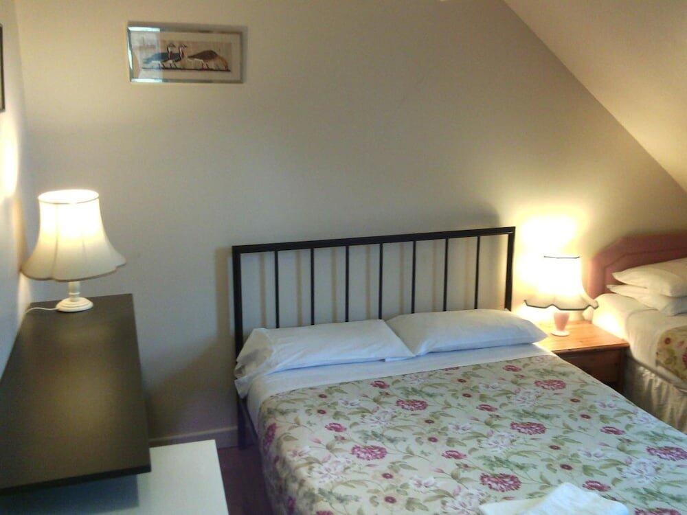 Foto de una habitación de Hostal Amazon Guest House