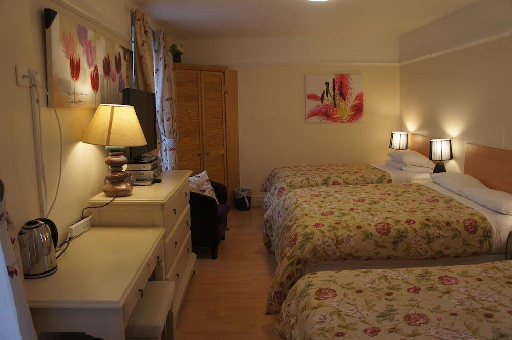Foto de una habitación de Hostal Amazon Guest House