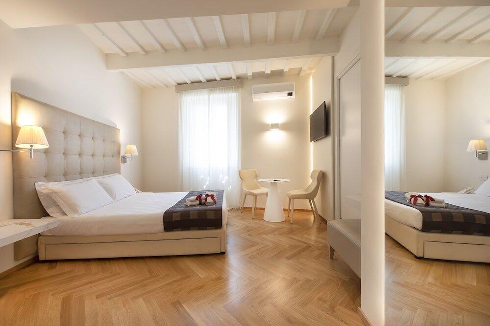 Foto de una habitación de Asisium Boutique Hotel