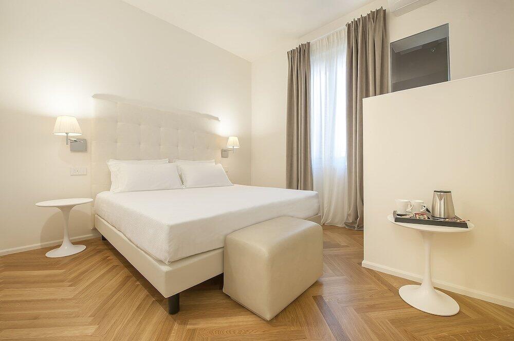 Foto de una habitación de Asisium Boutique Hotel