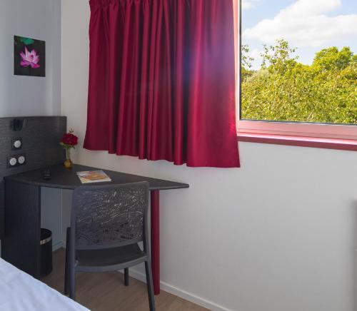 Foto de una habitación de Hotel CIS Paris Kellermann