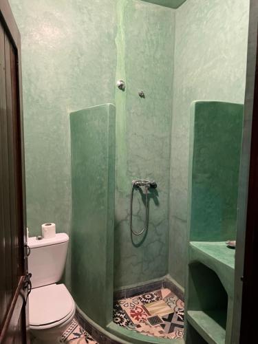 Foto del baño de Hotel ETOILE FILANTE D Or
