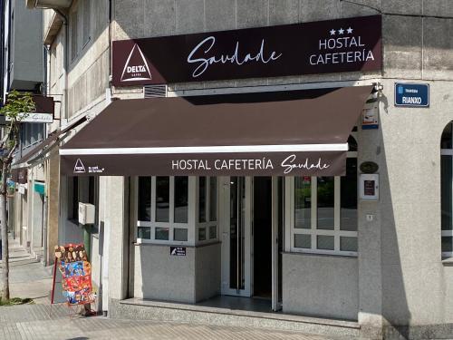Foto de una habitación de Saudade Hostal Cafetería