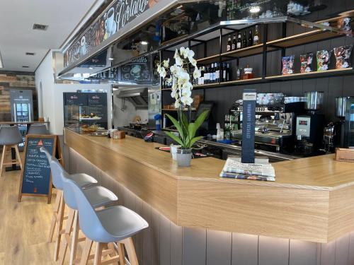 Foto de una habitación de Saudade Hostal Cafetería