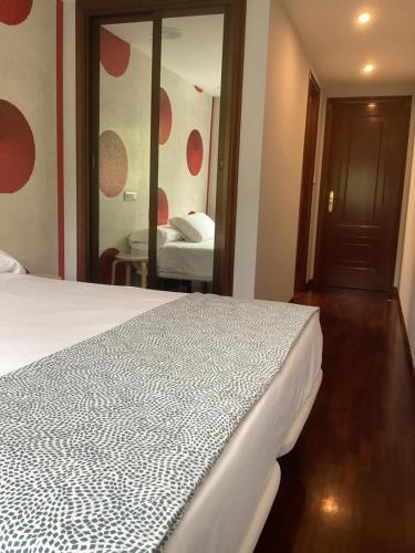 Foto de una habitación de Saudade Hostal Cafetería