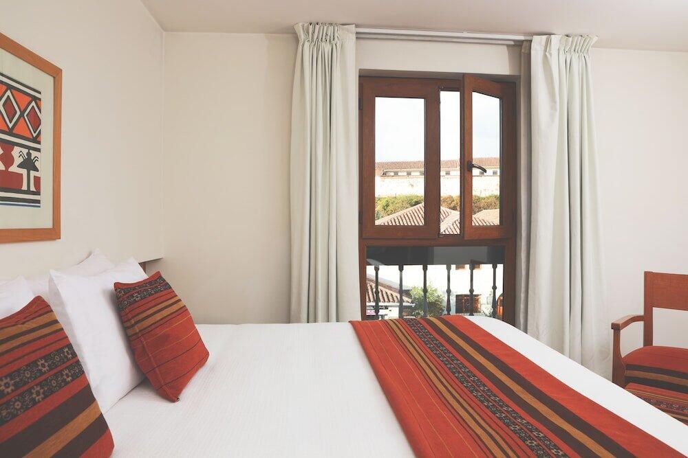 Foto de una habitación de Hotel San Agustin Plaza