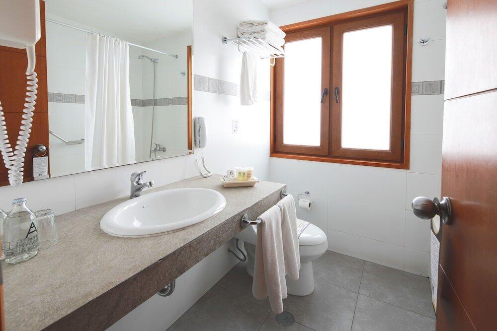 Foto del baño de Hotel San Agustin Plaza