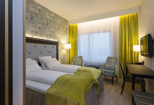 Foto de una habitación de Thon Hotel Opera