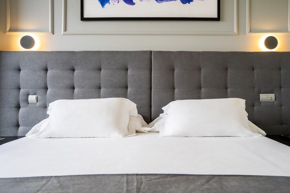Foto de una habitación de Abba Comillas Hotel