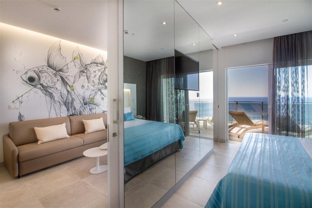 Foto de una habitación de Hotel ESTIMAR Suitopia 3 &amp;amp; three