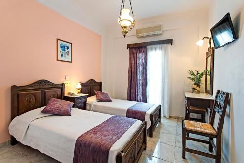 Foto de una habitación de Astir Thira Hotel