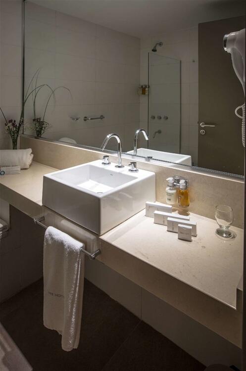 Foto del baño de Hotel Comahue Business