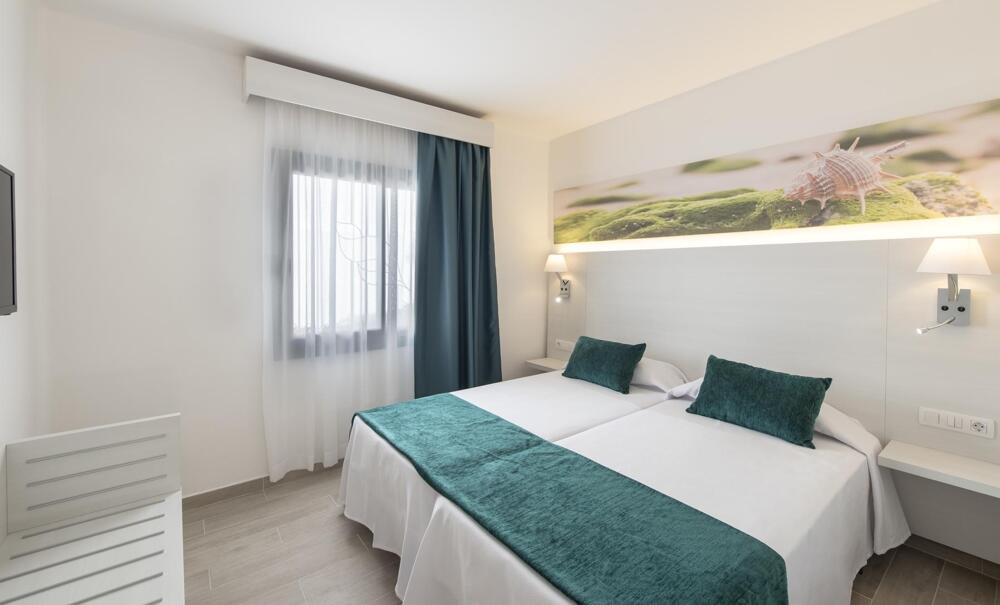 Foto de una habitación de Hotel THB Flora
