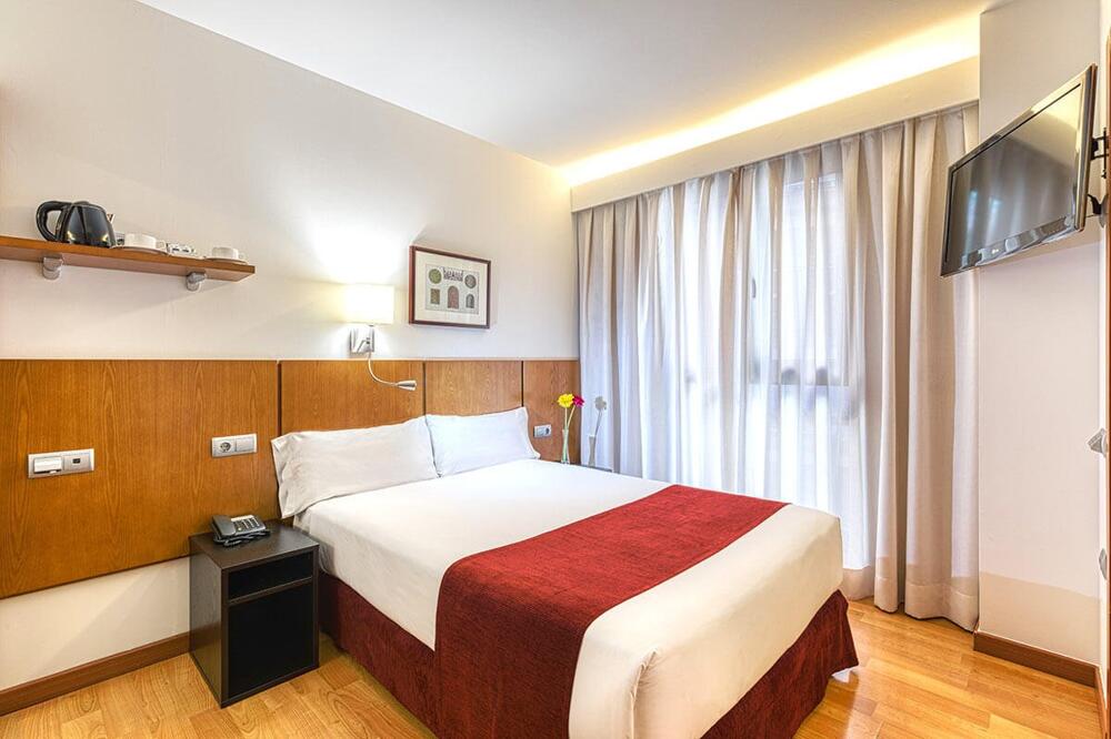 Foto de una habitación de Hotel Senator Granada