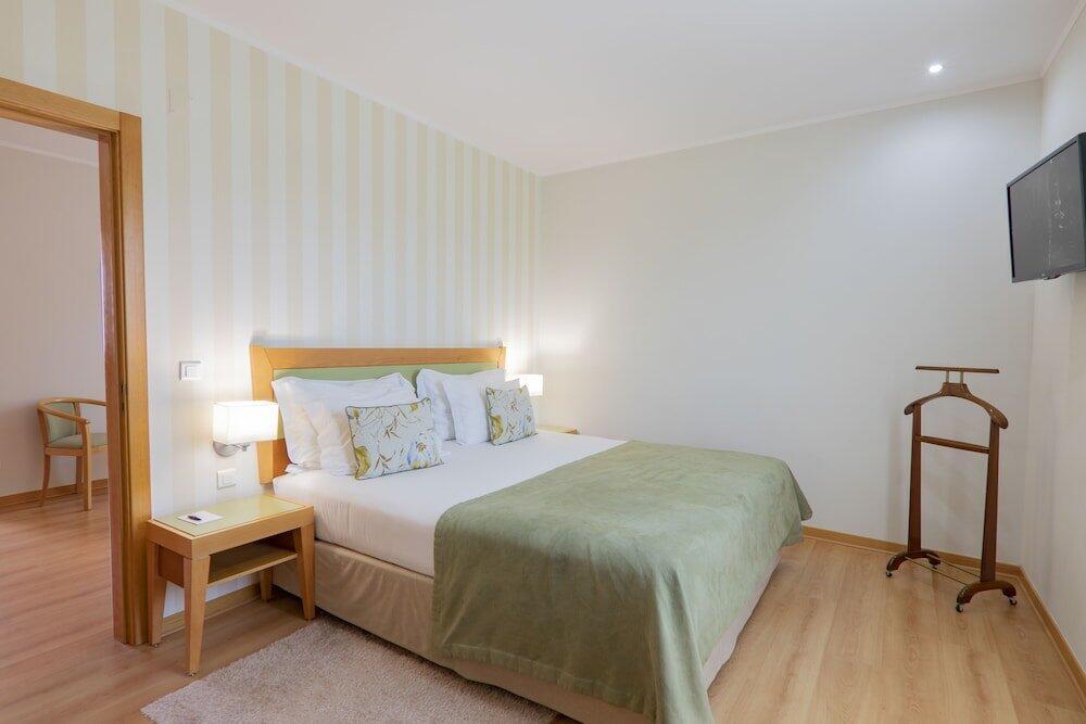 Foto de una habitación de Luna Esperanca Centro Hotel