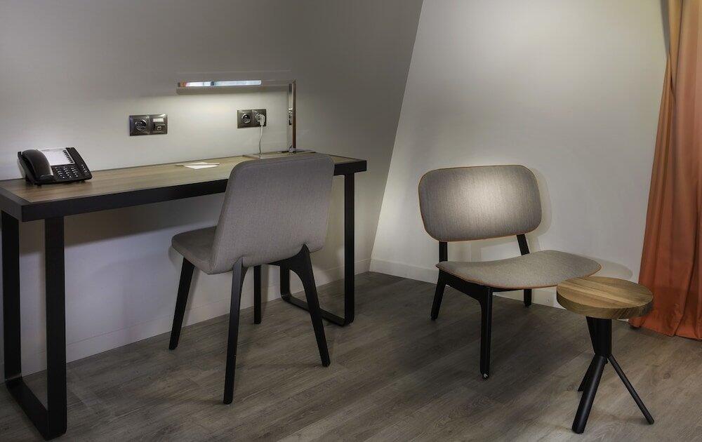 Foto de una habitación de Aparthotel Adagio Paris 19ème Cité de la Musique