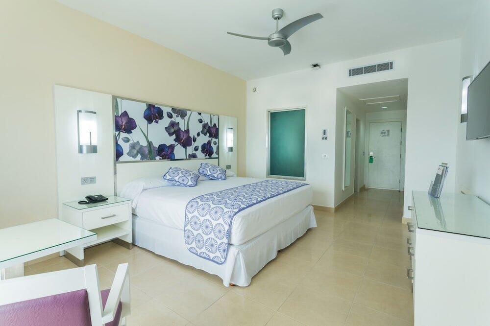 Foto de una habitación de Aparthotel Riu Playacar - All Inclusive