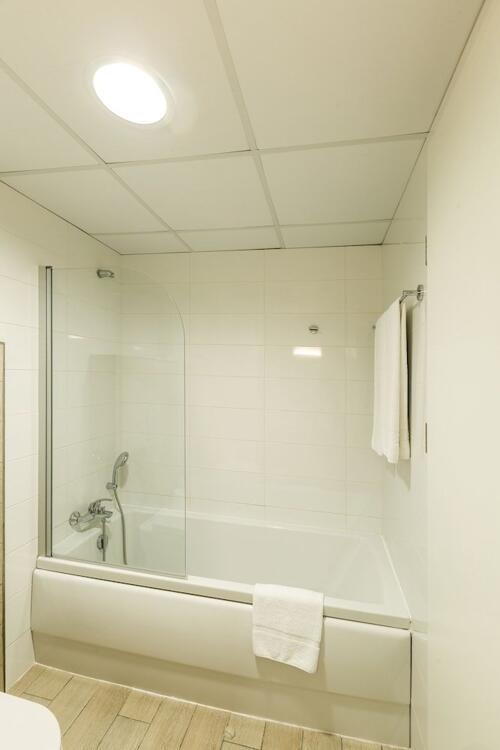 Foto del baño de AX ODYCY Hotel