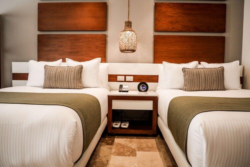 Foto de una habitación de Hotel The Reef 28 - Adults Only - All Suites - Optional All Inclusive