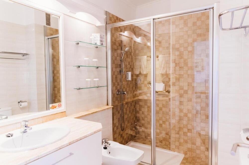 Foto del baño de Apartamentos Parque del Sol