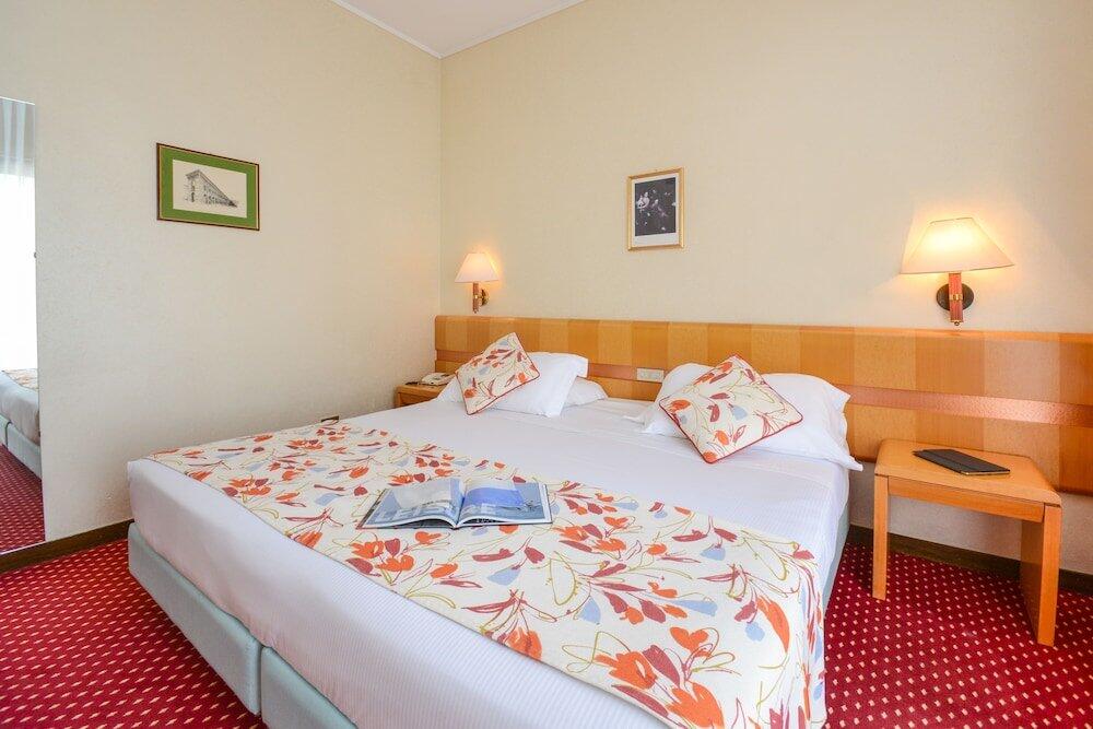 Foto de una habitación de Hotel Oliveto