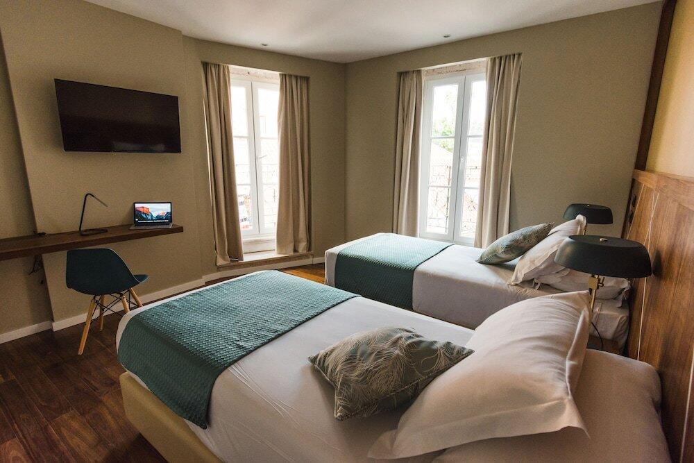 Foto de una habitación de Rossio Boutique Hotel