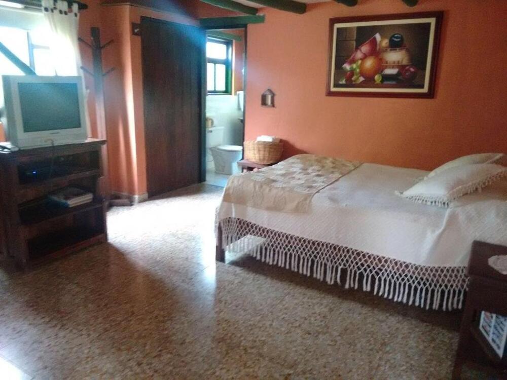 Foto de una habitación de Hotel Iguaque Campestre Spa &amp;amp; Ecolodge