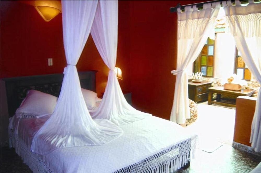 Foto de una habitación de Hotel Iguaque Campestre Spa &amp;amp; Ecolodge