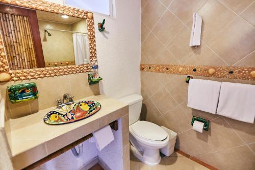 Foto del baño de Hotel Suites Ixtapa Plaza