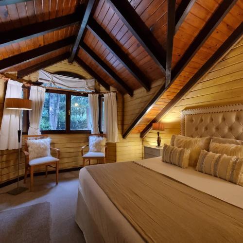 Foto de una habitación de Hotel Altos Los Pioneros &amp;amp; Spa