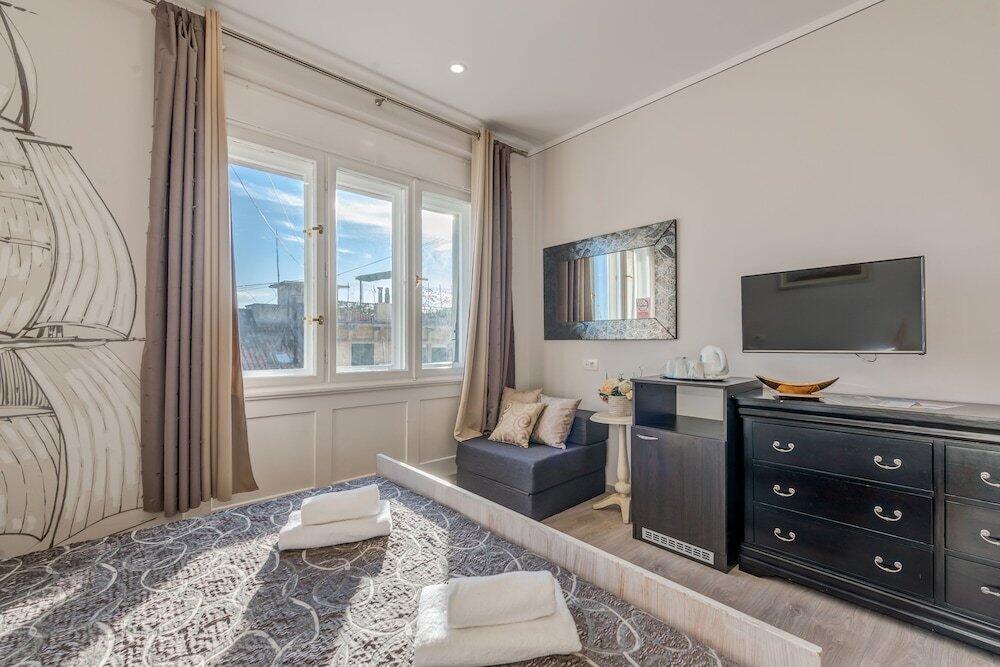 Foto de una habitación de Metropole Luxury Rooms
