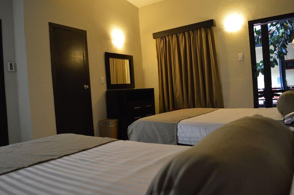 Foto de una habitación de Hotel La Siesta