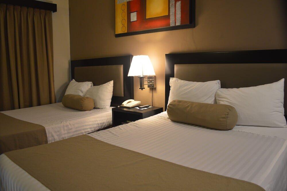 Foto de una habitación de Hotel La Siesta