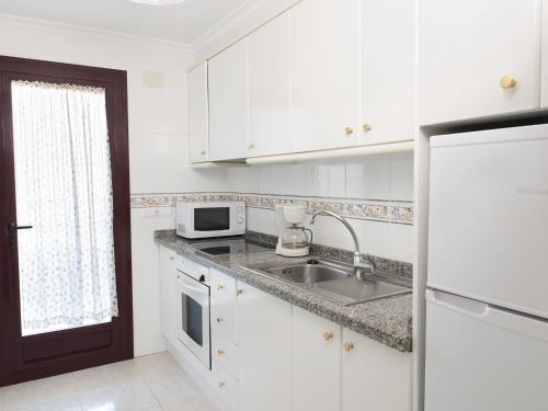 Foto de una habitación de Apartamentos Topacio Unitursa