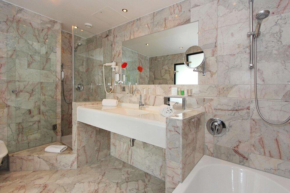Foto del baño de Hotel ARCOTEL Nike Linz