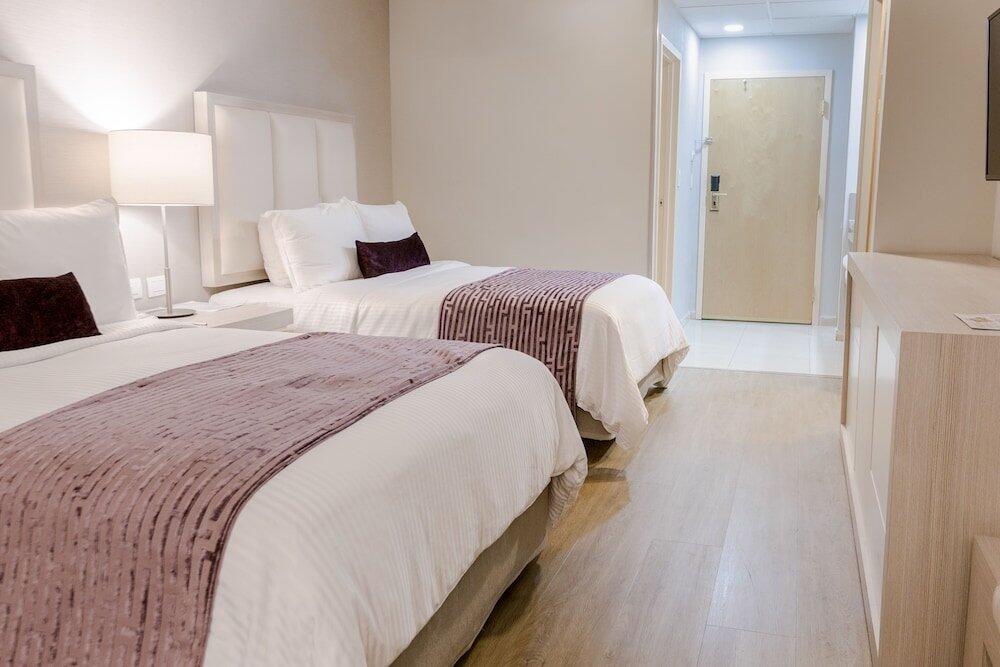 Foto de una habitación de Hotel Antaris Galerías