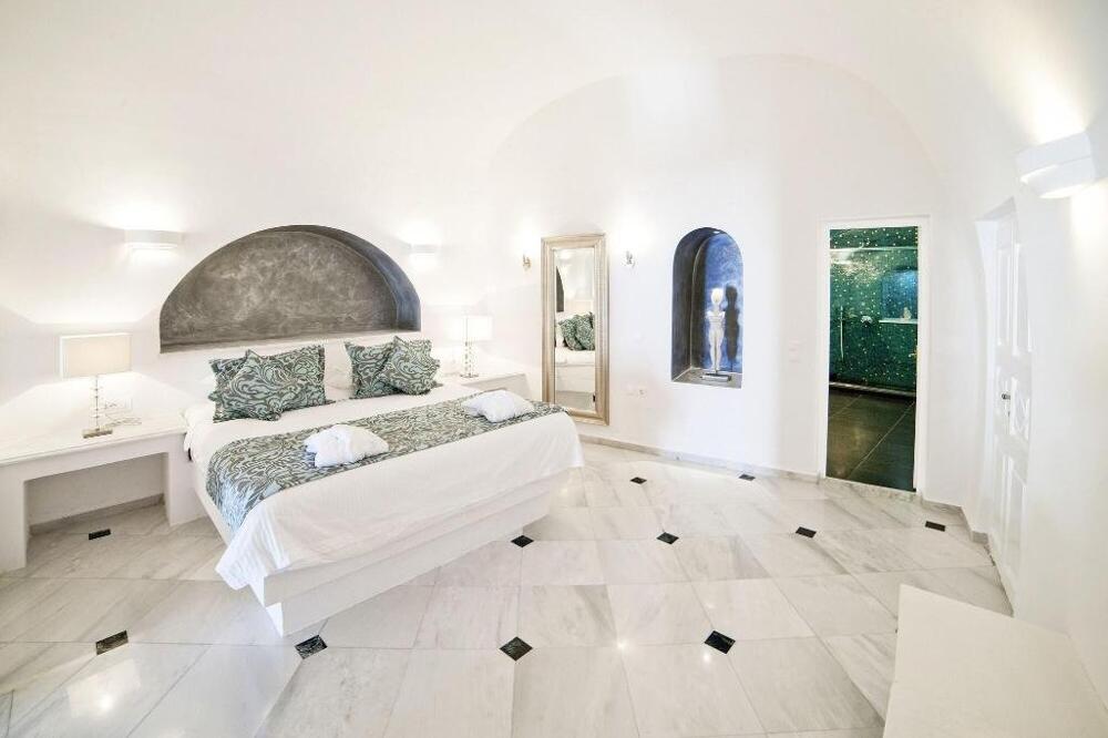 Foto de una habitación de Hotel Anteliz Suites