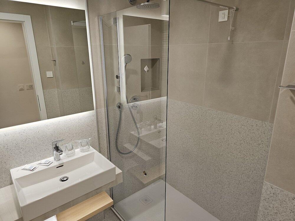 Foto del baño de Adria Hotel